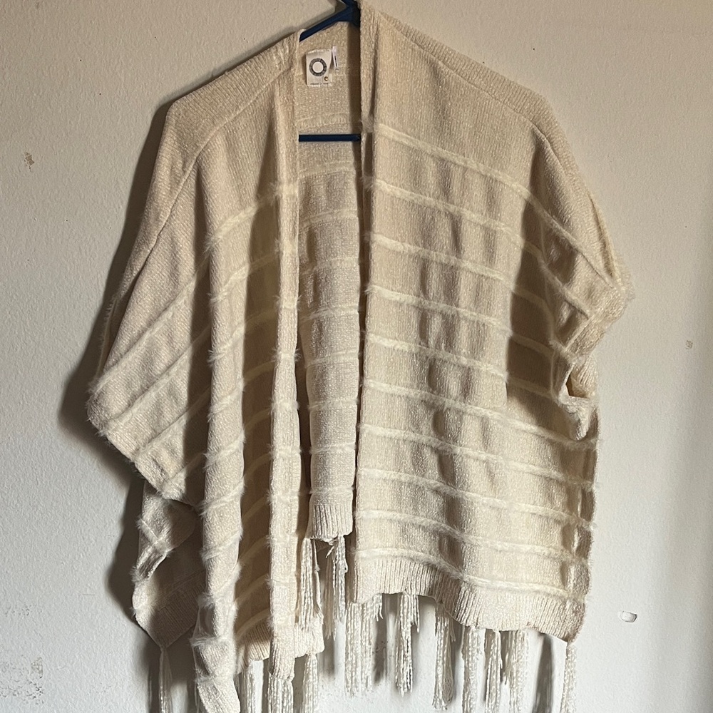 Elegant Cream Cape with Fringe